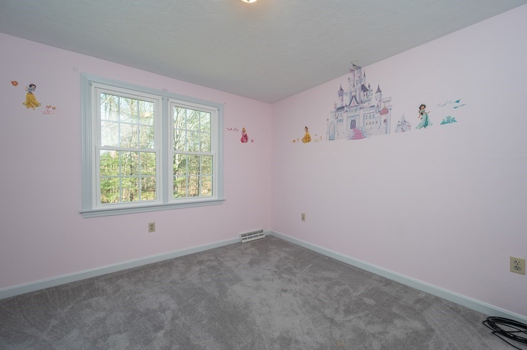 85 Elyse Road Mansfield, MA 02048 - Photo 17 of 30 an empty room with a window