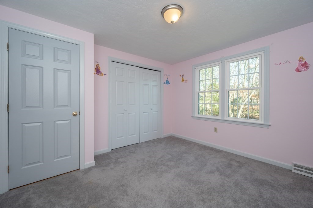 85 Elyse Road Mansfield, MA 02048 - Photo 18 of 30 an empty room with windows