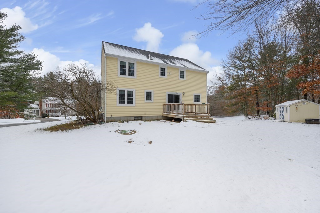 85 Elyse Road Mansfield, MA 02048 - Photo 23 of 30 a view of the house with snow on the background
