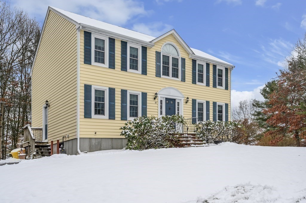 85 Elyse Road Mansfield, MA 02048 - Photo 24 of 30 a front view of a house with a yard