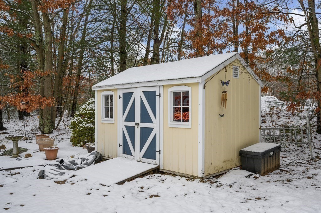 85 Elyse Road Mansfield, MA 02048 - Photo 25 of 30 a view of a patio with a yard
