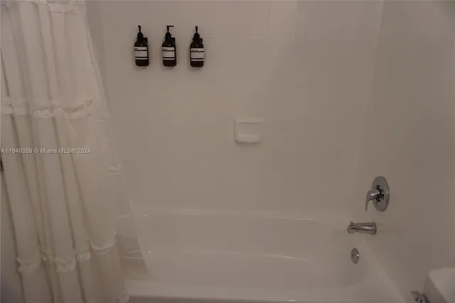 a kitchen with counter top space cabinets and stainless steel appliances