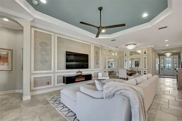 a bathroom with a granite countertop sink mirror vanity and toilet