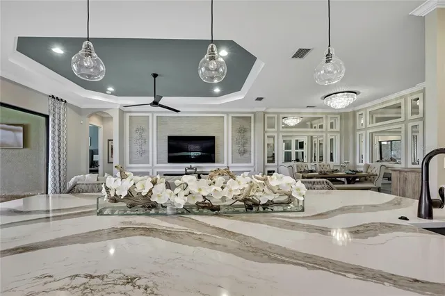 a bedroom with a bed and a lamp