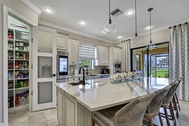 a bathroom with a shower and a sink