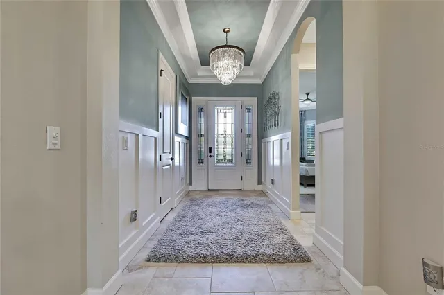 a living room with fireplace furniture and a flat screen tv