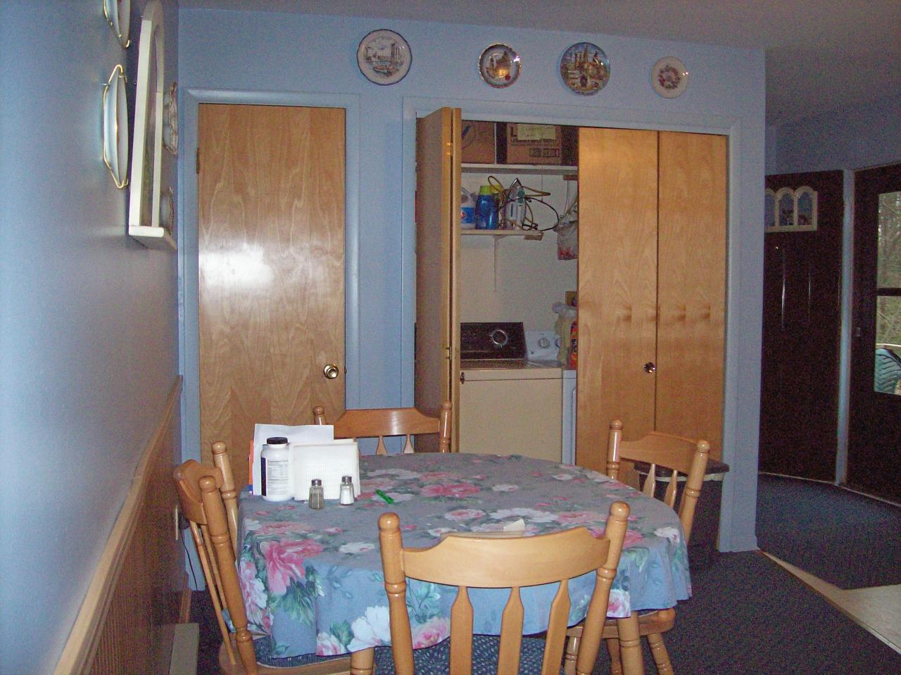 606 Frailey Road Stroudsburg, PA 18360 - Photo 3 of 11 a dining room with furniture and wooden floor