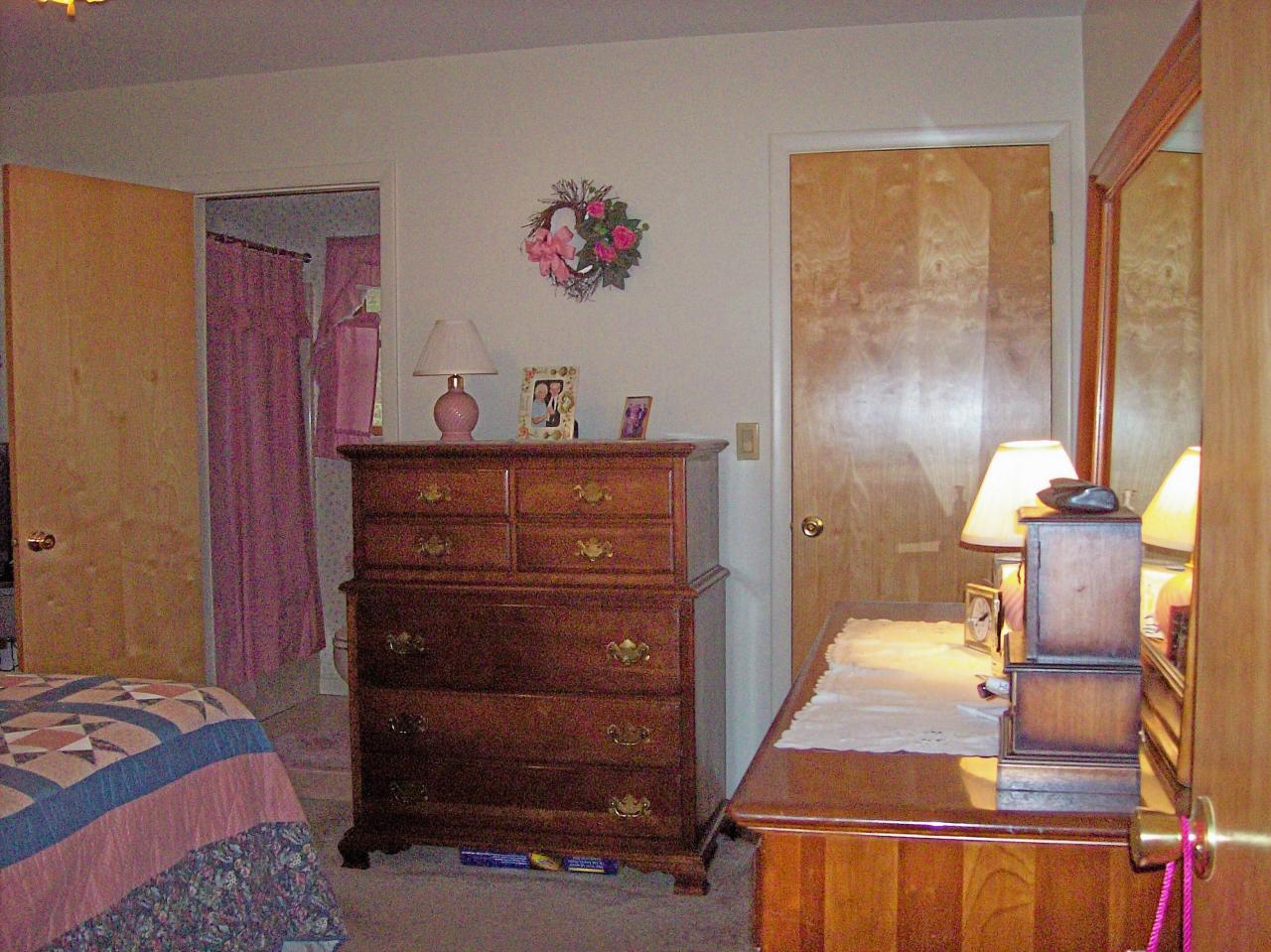 606 Frailey Road Stroudsburg, PA 18360 - Photo 7 of 11 a bedroom with a bed and a dresser
