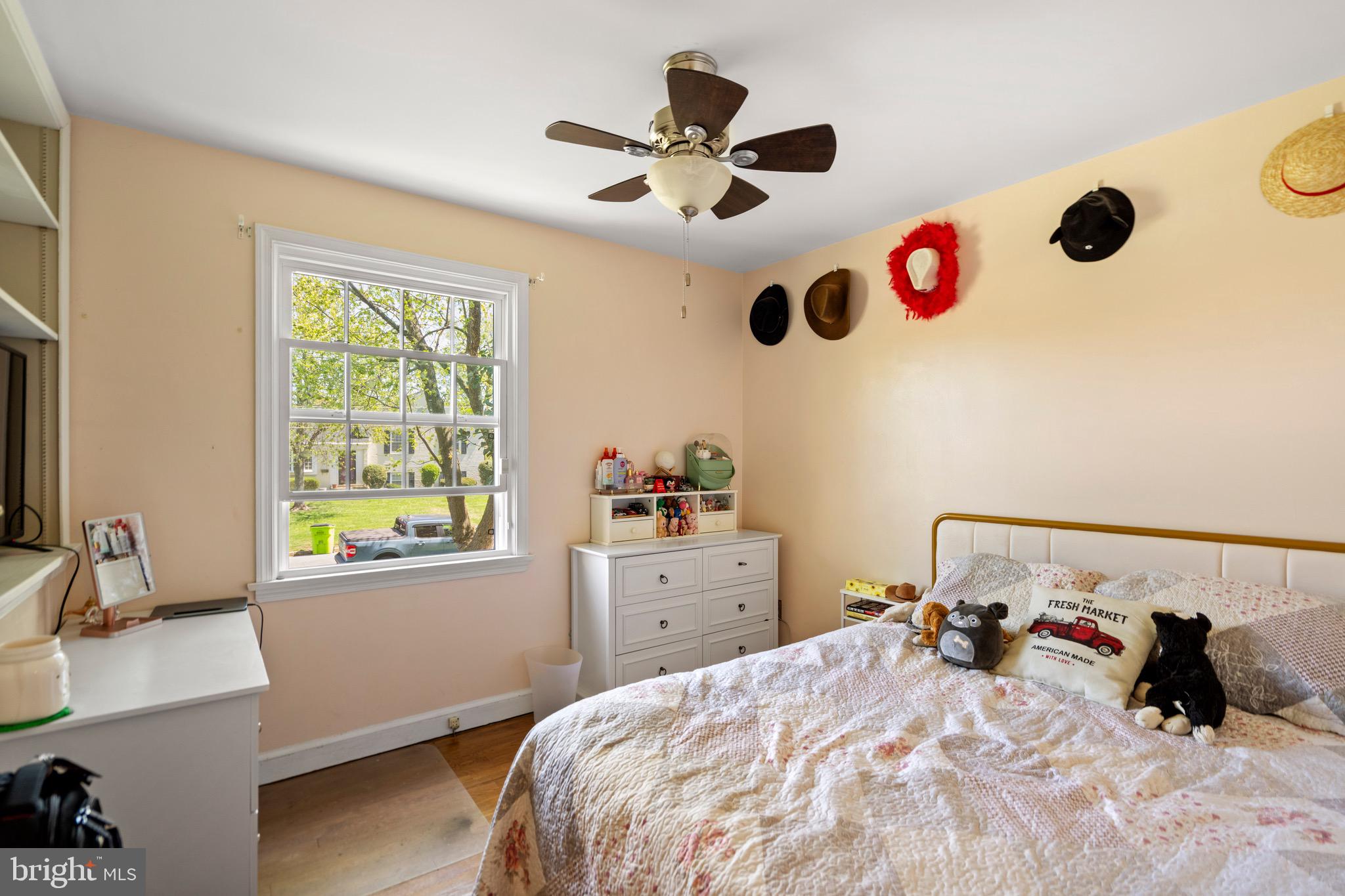 6110 Dorchester Street Springfield, VA 22150 - Photo 20 of 38 a bed room with a bed and a window