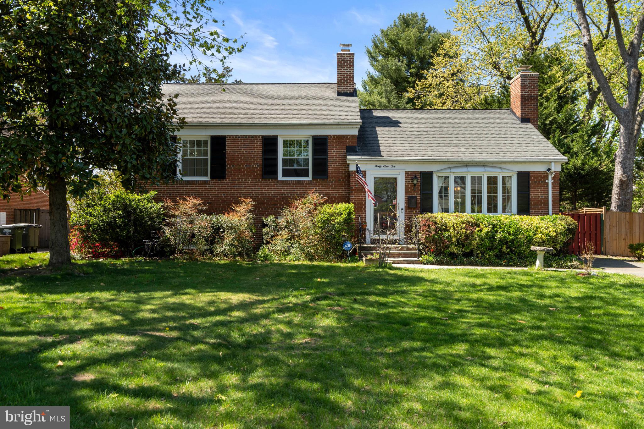 6110 Dorchester Street Springfield, VA 22150 - Photo 2 of 38 a front view of a house with a yard and porch