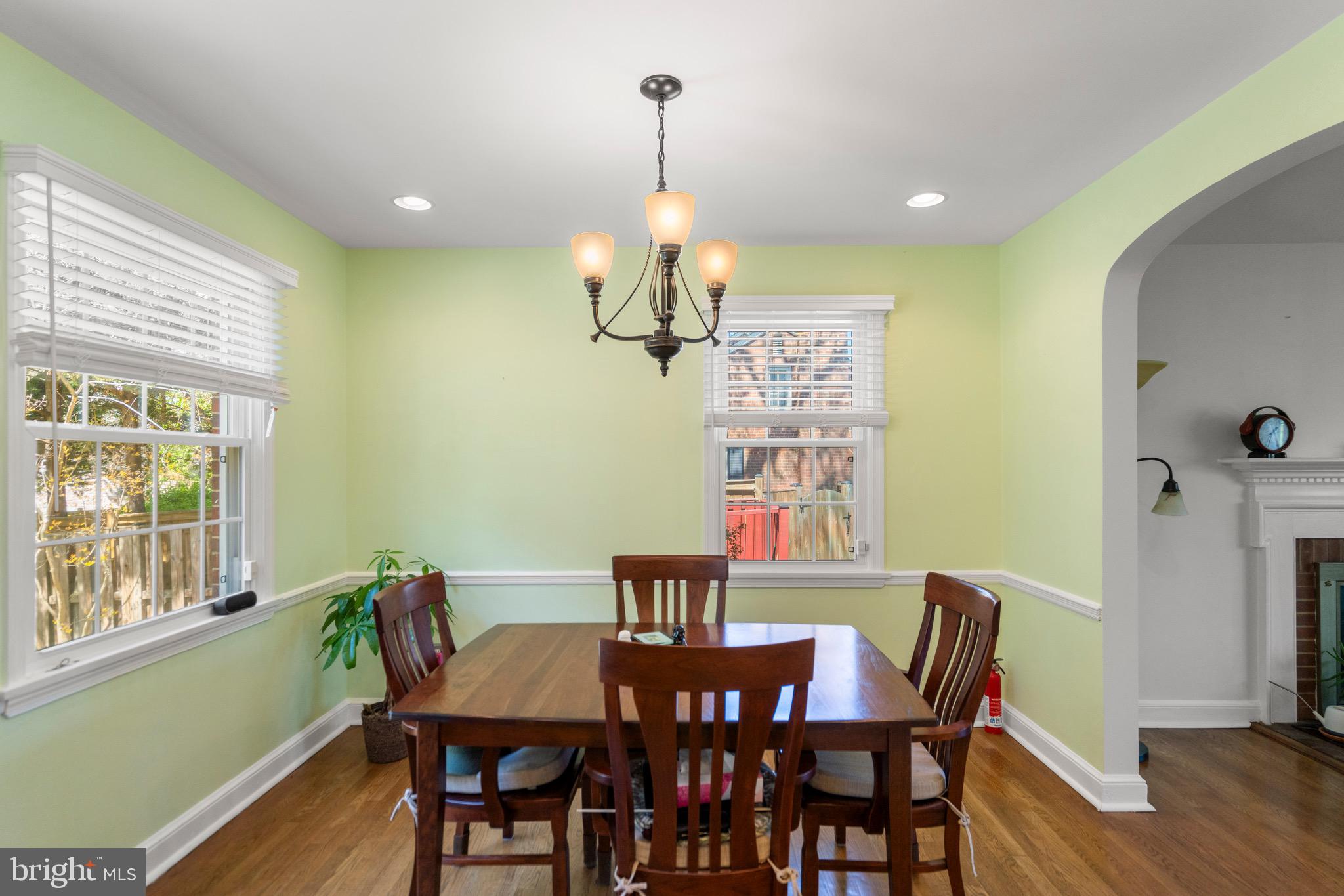 6110 Dorchester Street Springfield, VA 22150 - Photo 21 of 38 a view of a dining room with furniture window and wooden floor