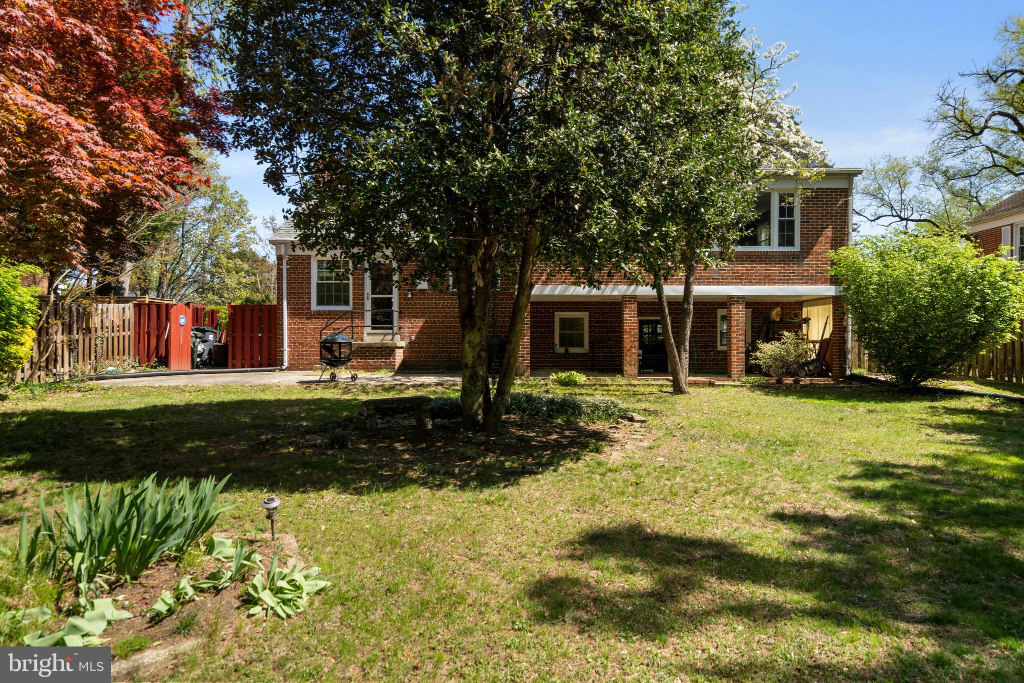 6110 Dorchester Street Springfield, VA 22150 - Photo 35 of 38 a front view of a house with a yard