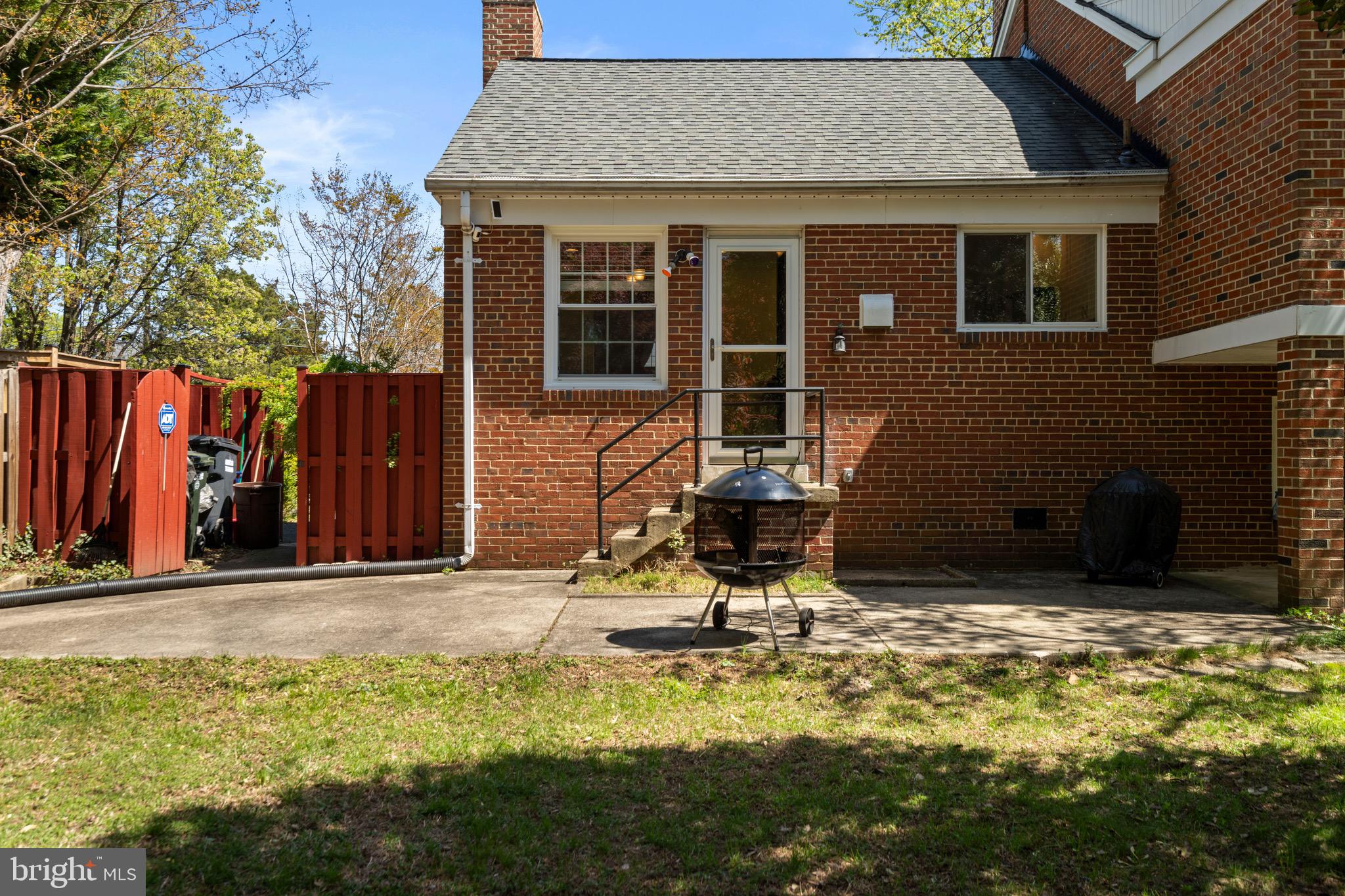 6110 Dorchester Street Springfield, VA 22150 - Photo 36 of 38 a view of a house with backyard porch and sitting area