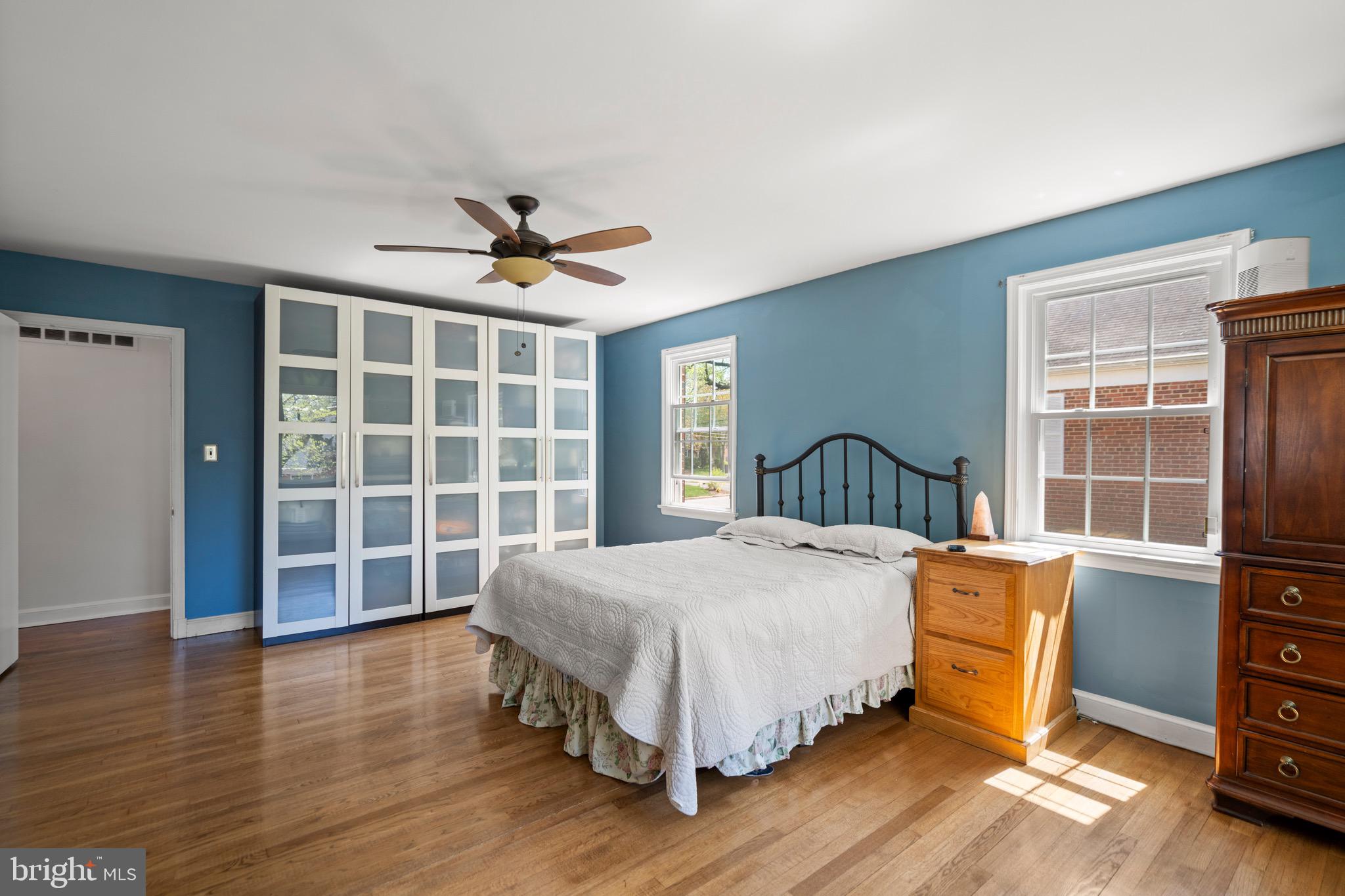 6110 Dorchester Street Springfield, VA 22150 - Photo 6 of 38 a bedroom with a bed and a large window