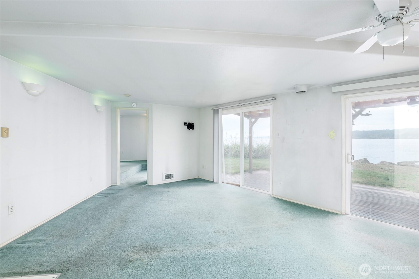 2711 Day Island Boulevard West University Place, WA 98466 - Photo 12 of 17 wooden floor in an empty room with a window