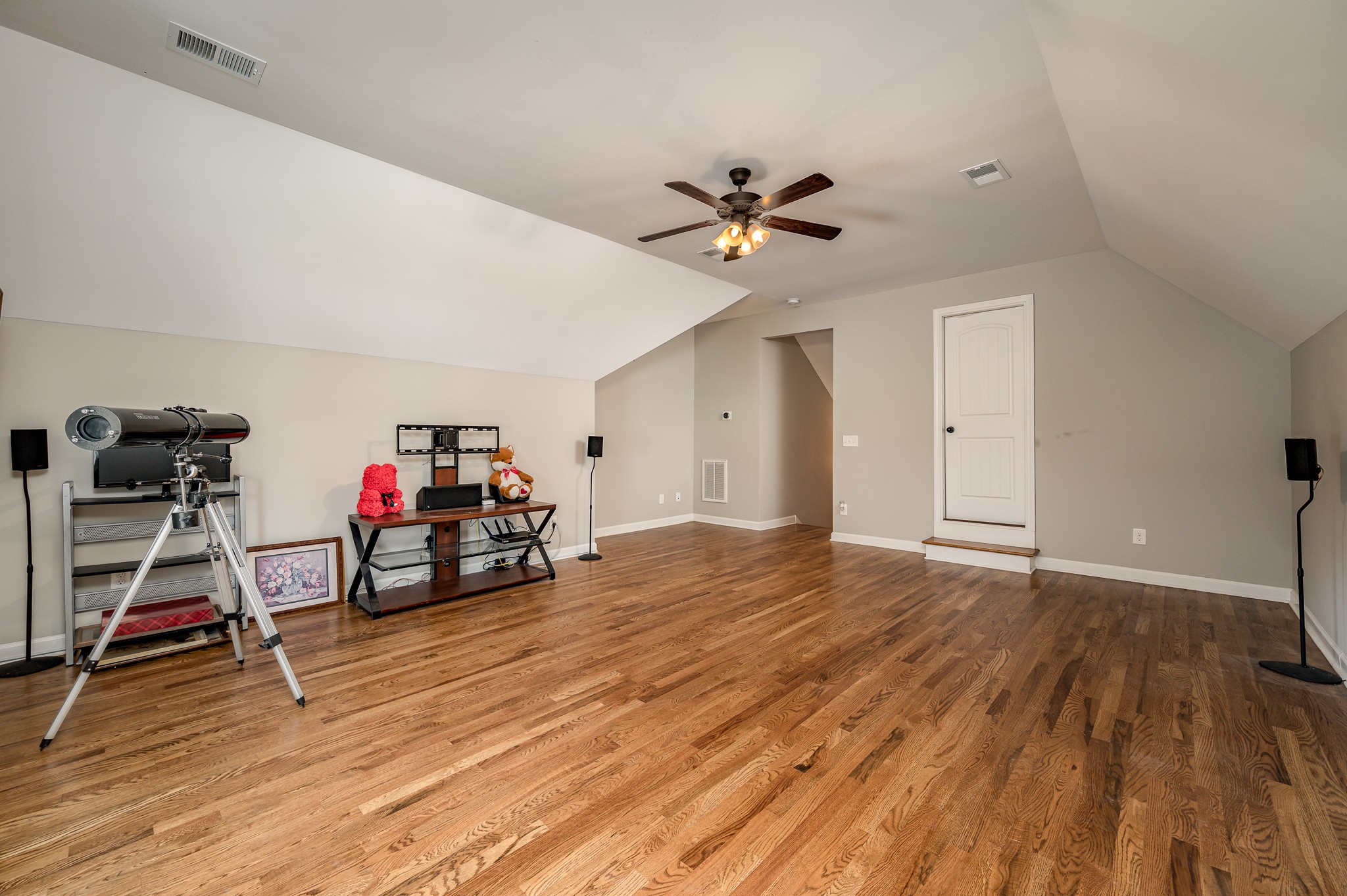 308 Amazonway Ridge Lascassas, TN 37085 - Photo 18 of 23 a view of a room with gym equipment and wooden floor