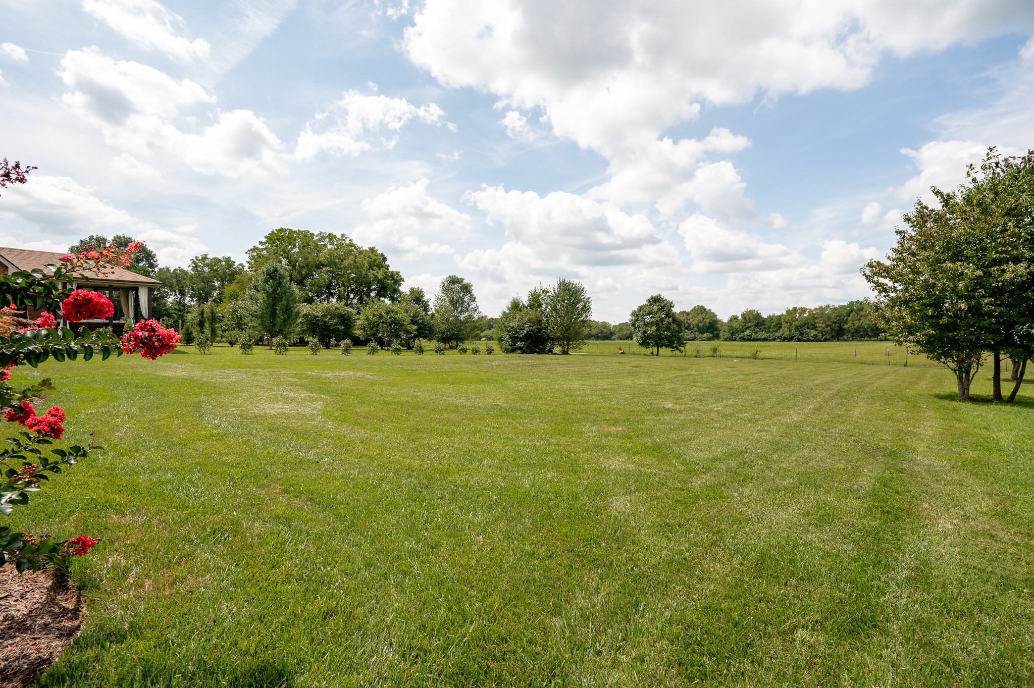 308 Amazonway Ridge Lascassas, TN 37085 - Photo 20 of 23 a view of a lake with houses in the back