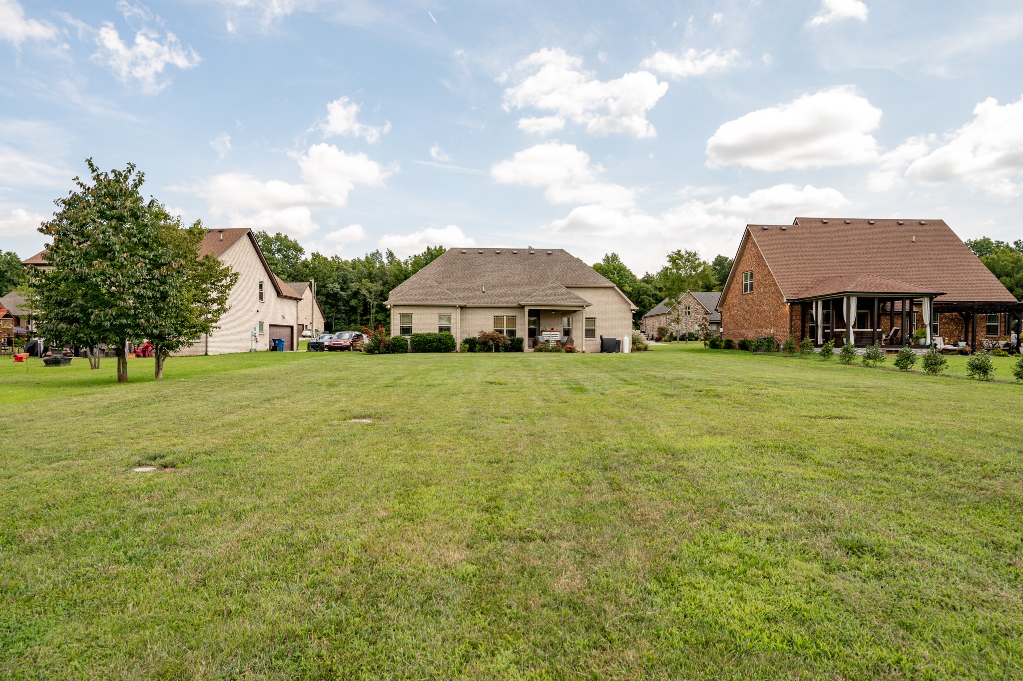 308 Amazonway Ridge Lascassas, TN 37085 - Photo 21 of 23 a view of a house with a yard and sitting area