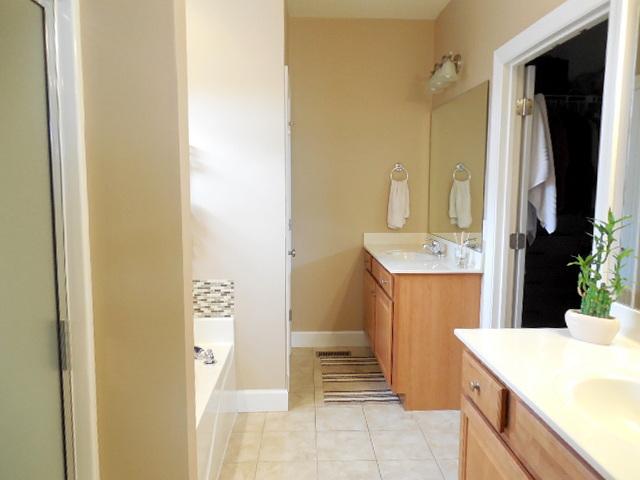 414 Conquest Road Murfreesboro, TN 37128 - Photo 8 of 18 Awesome Master Bath with Tile Flooring, Separate Sinks, 6' Garden Tub, Separate Shower and Huge Walk In Closet