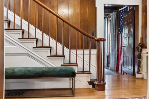 a kitchen with cabinets a sink and a window
