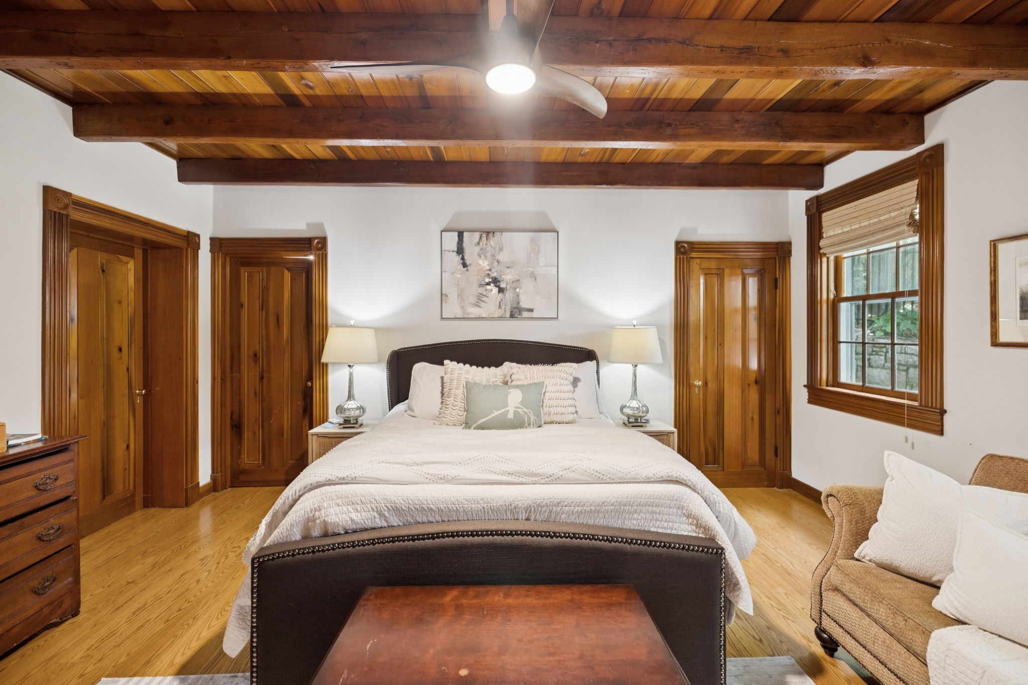 3507 Wimbledon Road Nashville, TN 37215 - Photo 22 of 50 a bedroom with a bed and a dresser with wooden floor