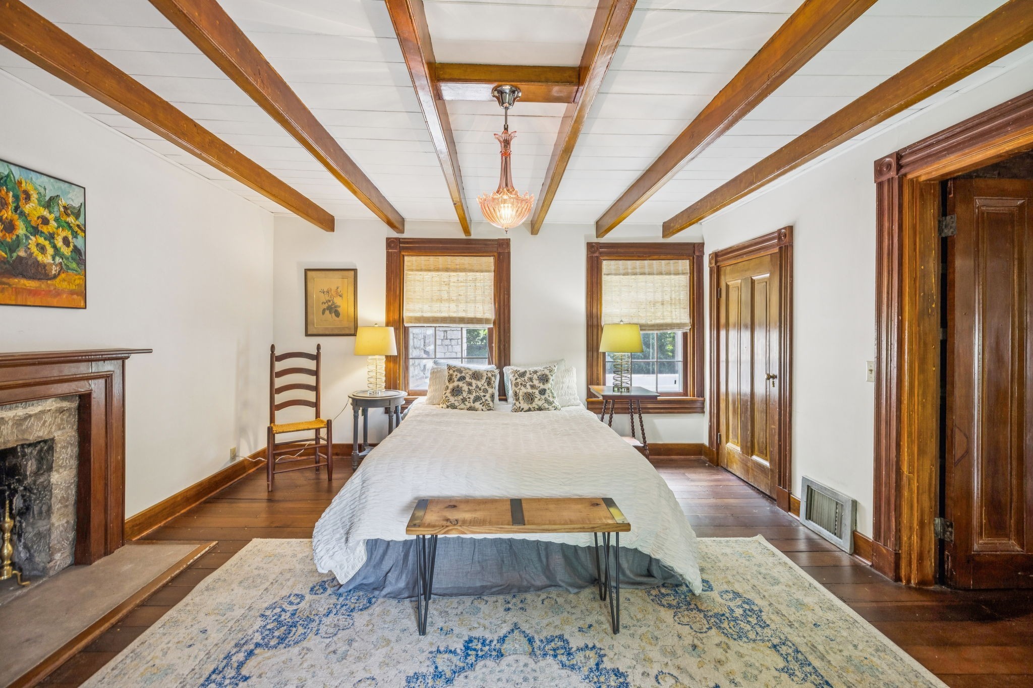 3507 Wimbledon Road Nashville, TN 37215 - Photo 30 of 50 a living room with furniture a rug wooden floor and a fireplace