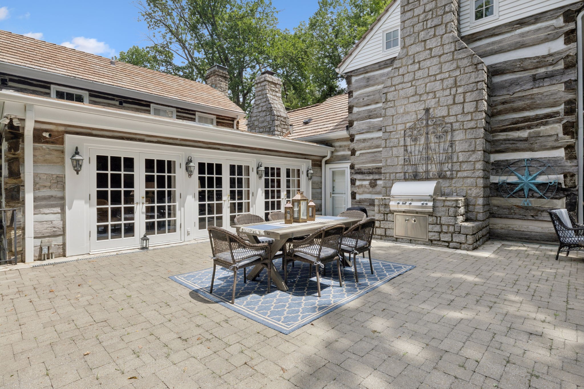 3507 Wimbledon Road Nashville, TN 37215 - Photo 38 of 50 a view of a patio with table and chairs and wooden fence
