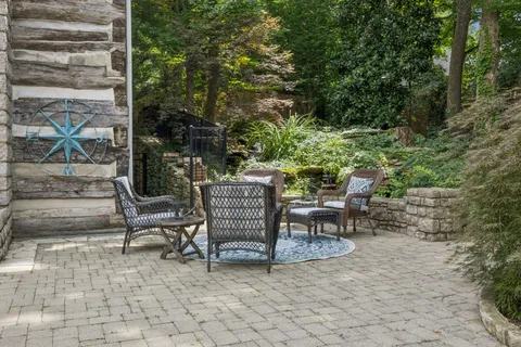 a view of a tables and chairs in the patio