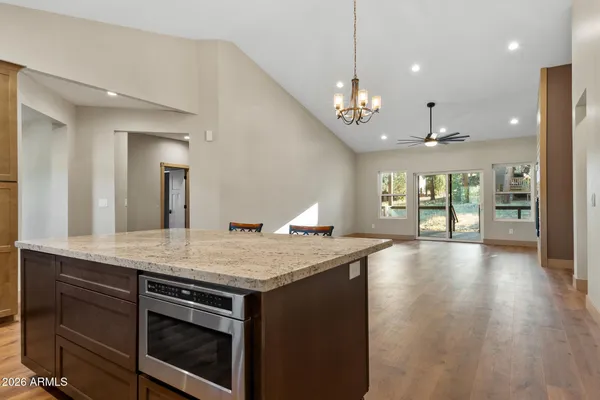a bathroom with a double vanity sink a mirror and a shower