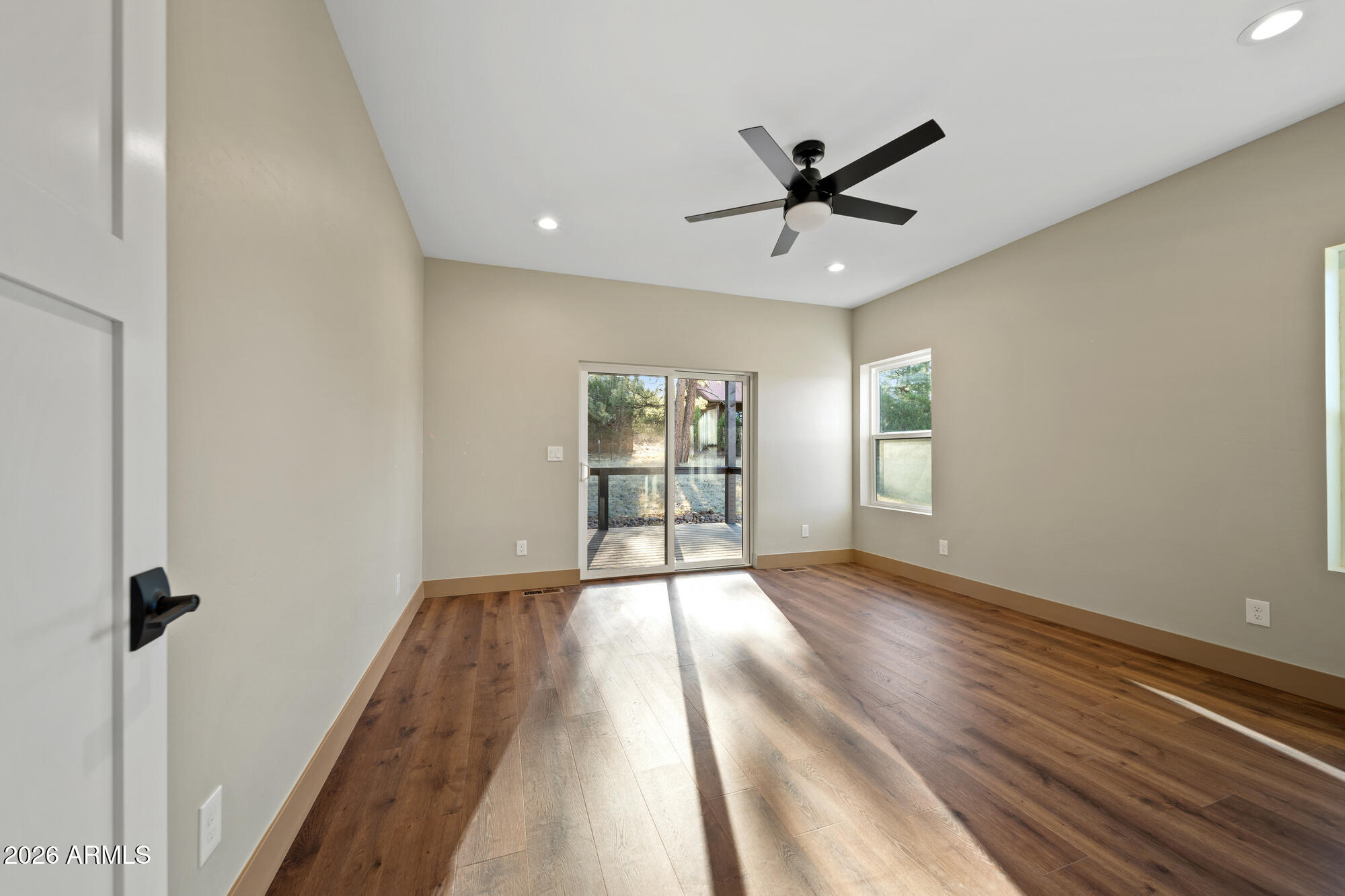 1380 Lakeside Trail Show Low, AZ 85901 - Photo 18 of 48 wooden floor in an empty room with a window