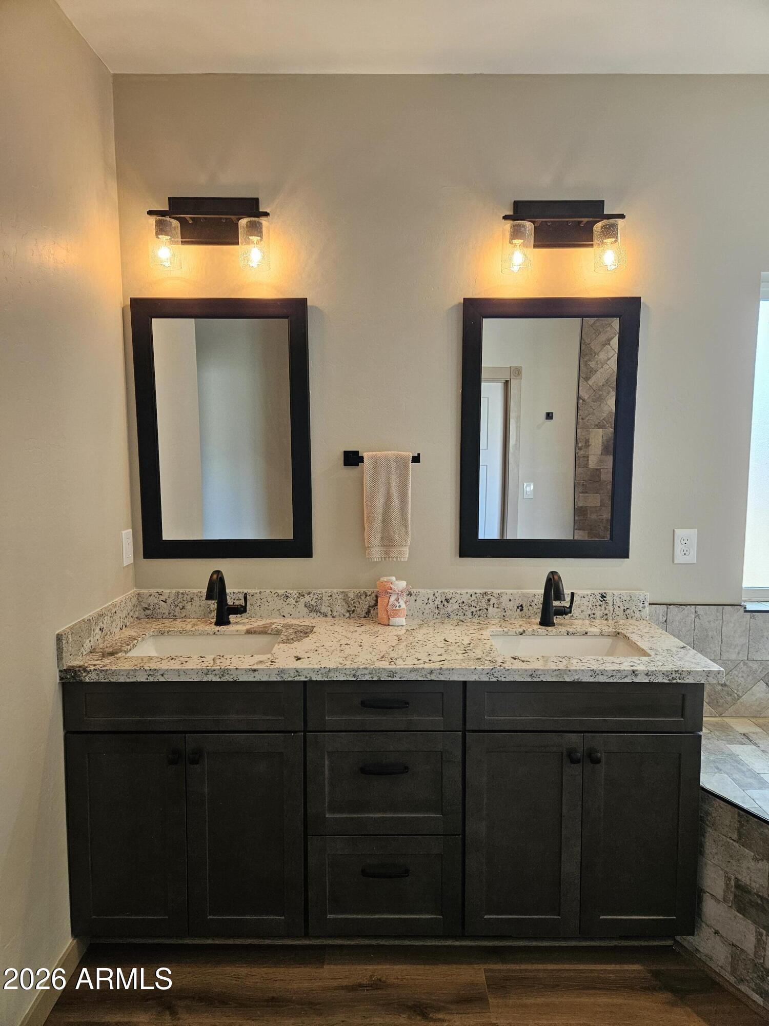 1380 Lakeside Trail Show Low, AZ 85901 - Photo 23 of 48 a bathroom with a double vanity sink and a mirror