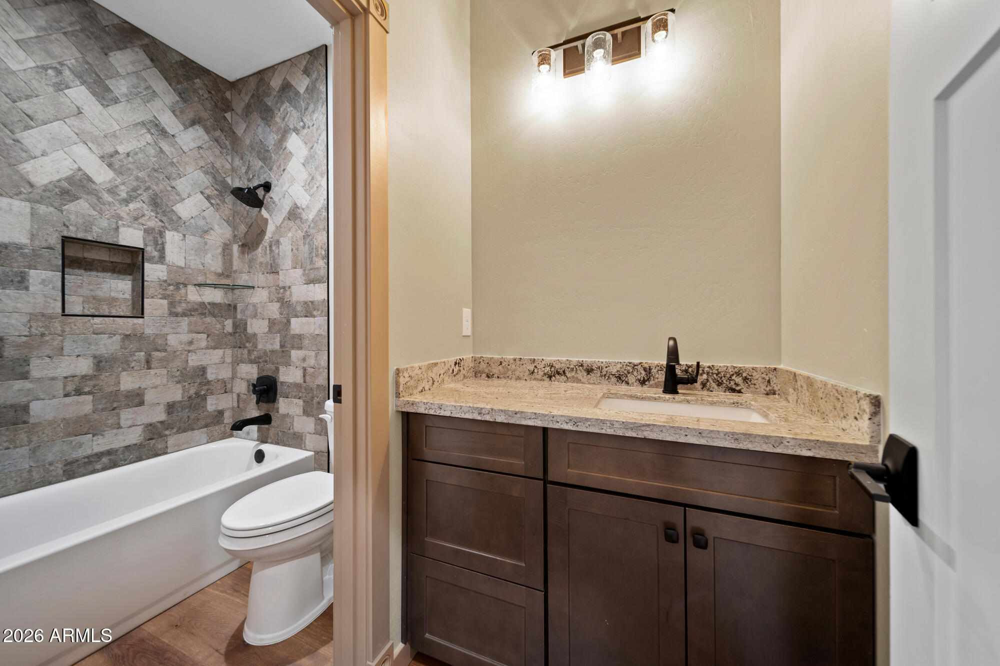 1380 Lakeside Trail Show Low, AZ 85901 - Photo 31 of 48 a bathroom with a sink a toilet and shower