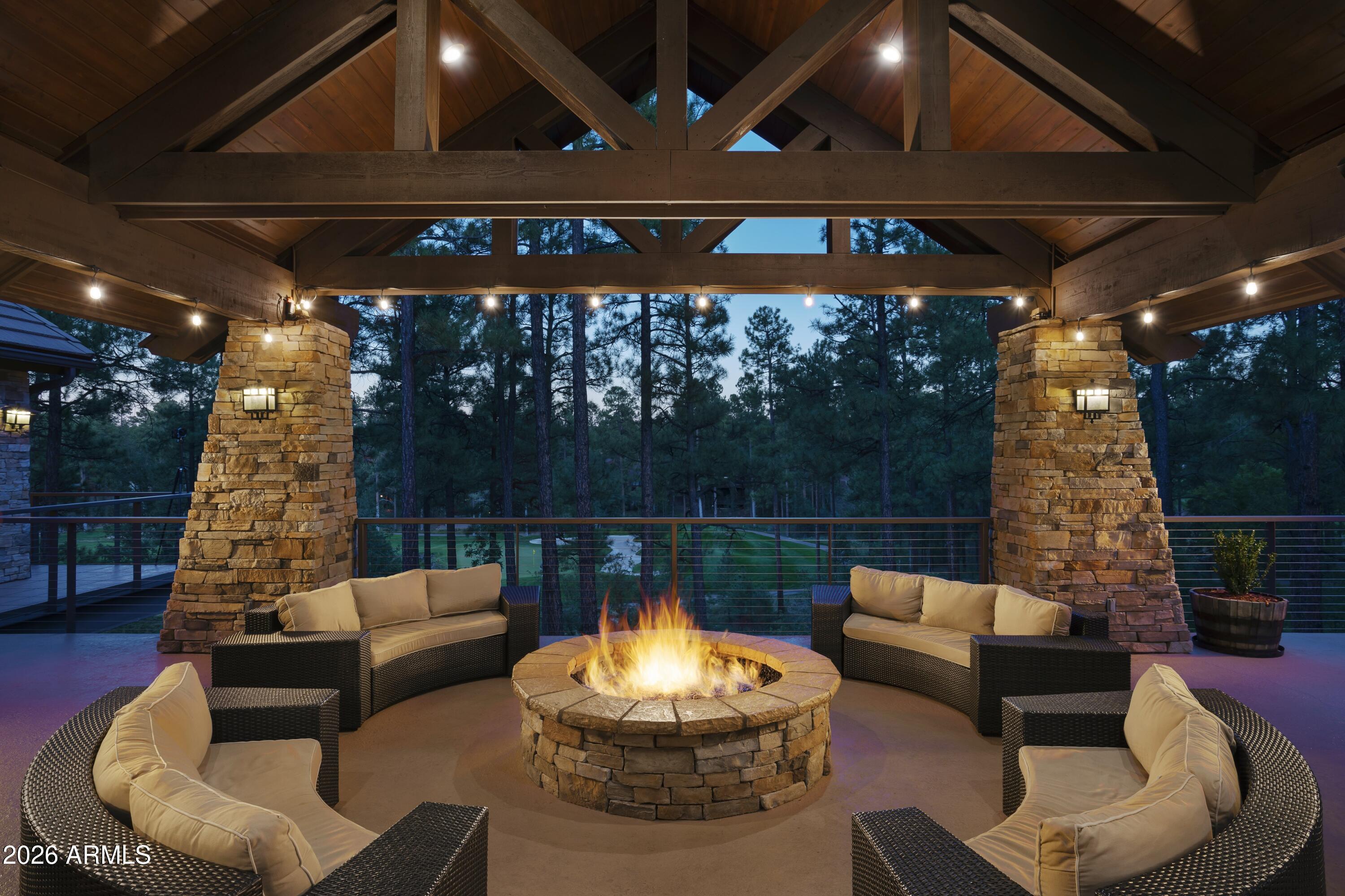 1380 Lakeside Trail Show Low, AZ 85901 - Photo 46 of 48 a outdoor living space with patio furniture and a fireplace