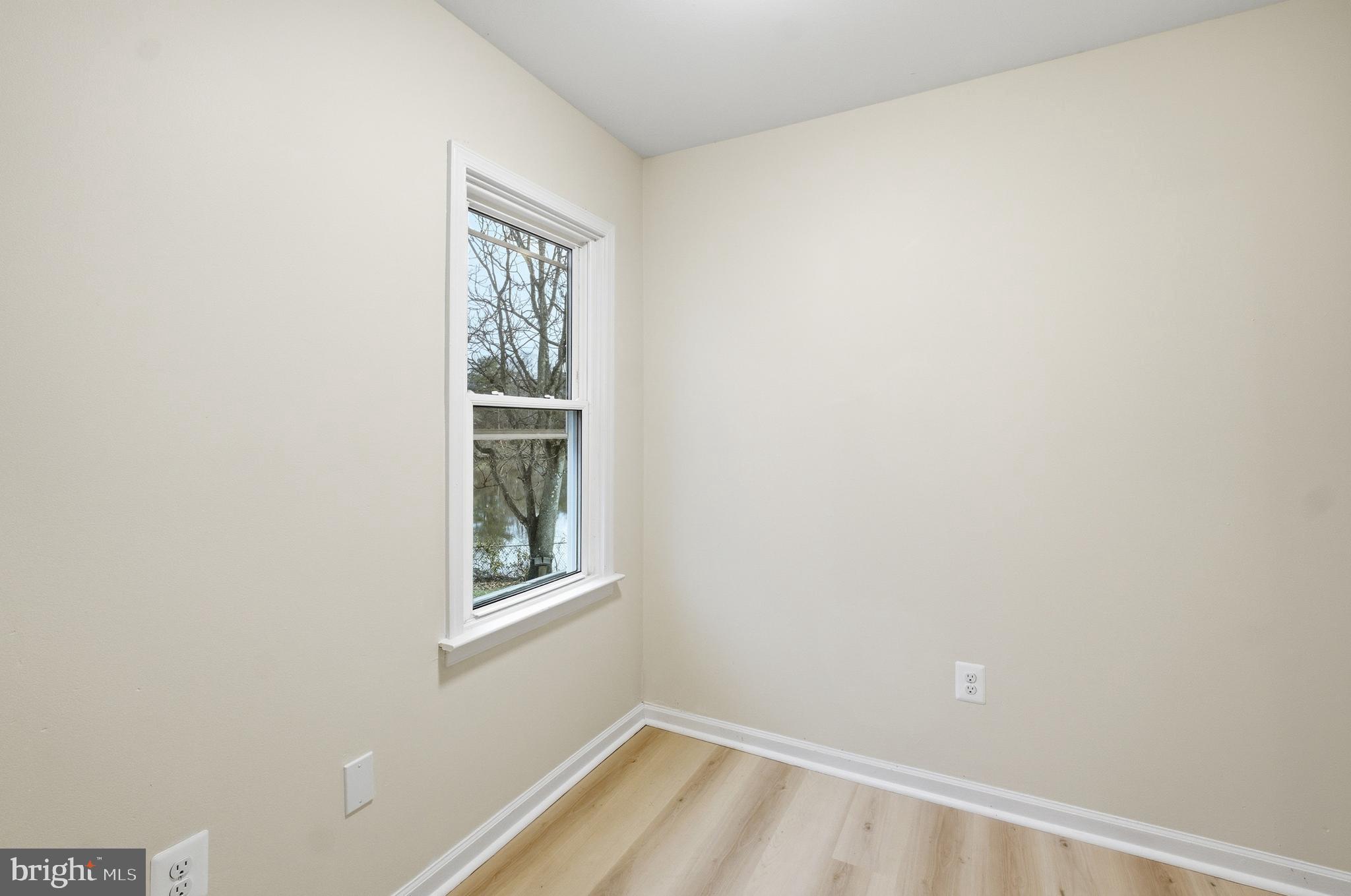1 Beach Road Glen Burnie, MD 21060 - Photo 18 of 54 a view of an empty room with windows