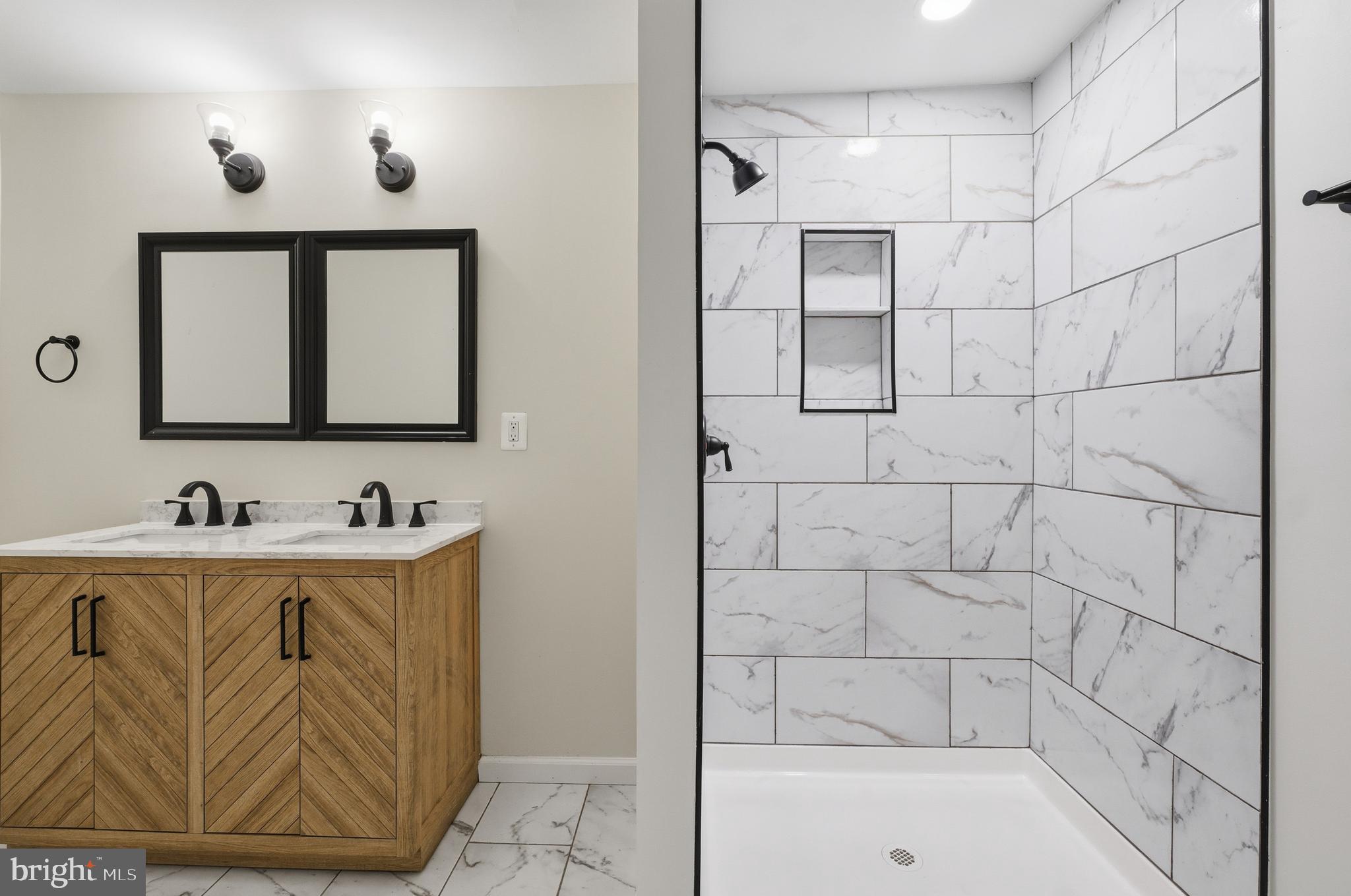 1 Beach Road Glen Burnie, MD 21060 - Photo 21 of 54 a bathroom with a sink a toilet and mirror