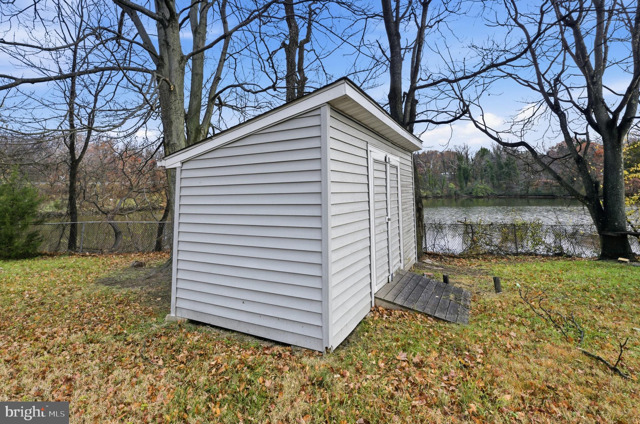 1 Beach Road Glen Burnie, MD 21060 - Photo 34 of 54 a view of a house with a yard