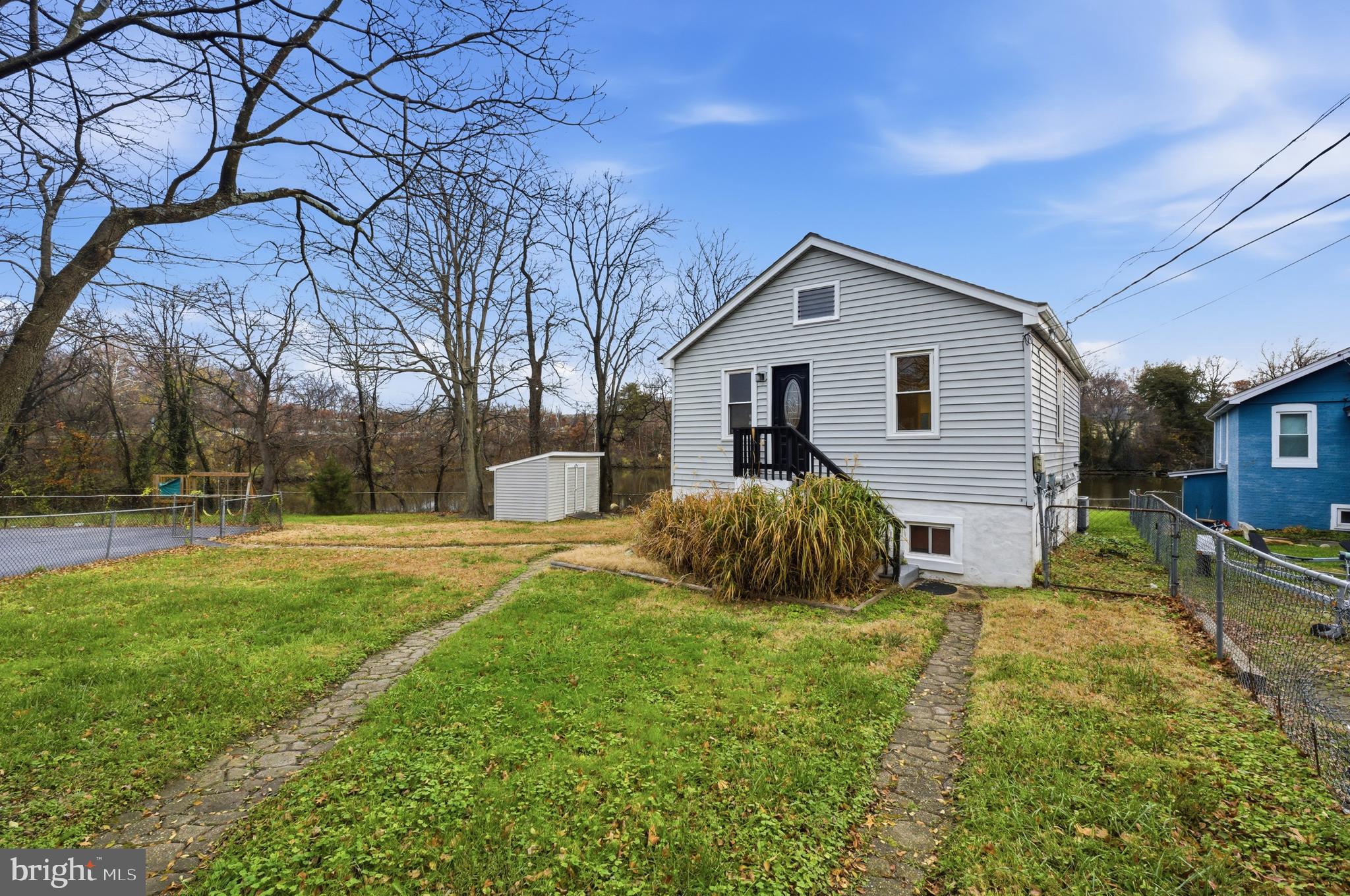 1 Beach Road Glen Burnie, MD 21060 - Photo 4 of 54 a view of a house with a yard