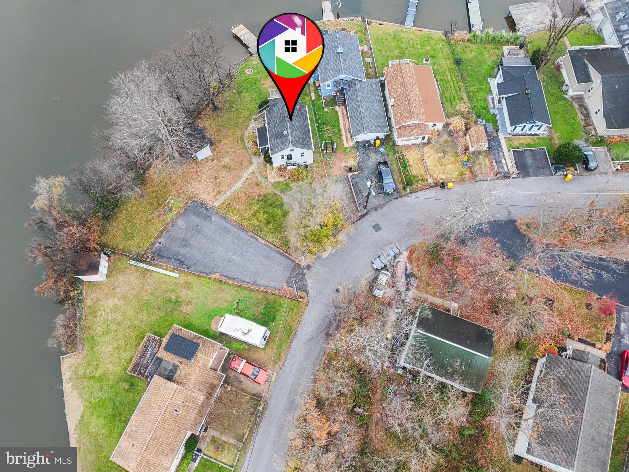 1 Beach Road Glen Burnie, MD 21060 - Photo 48 of 54 an aerial view of a house with a swimming pool