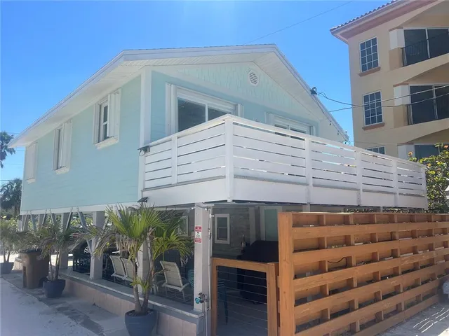 a front view of a building with glass windows