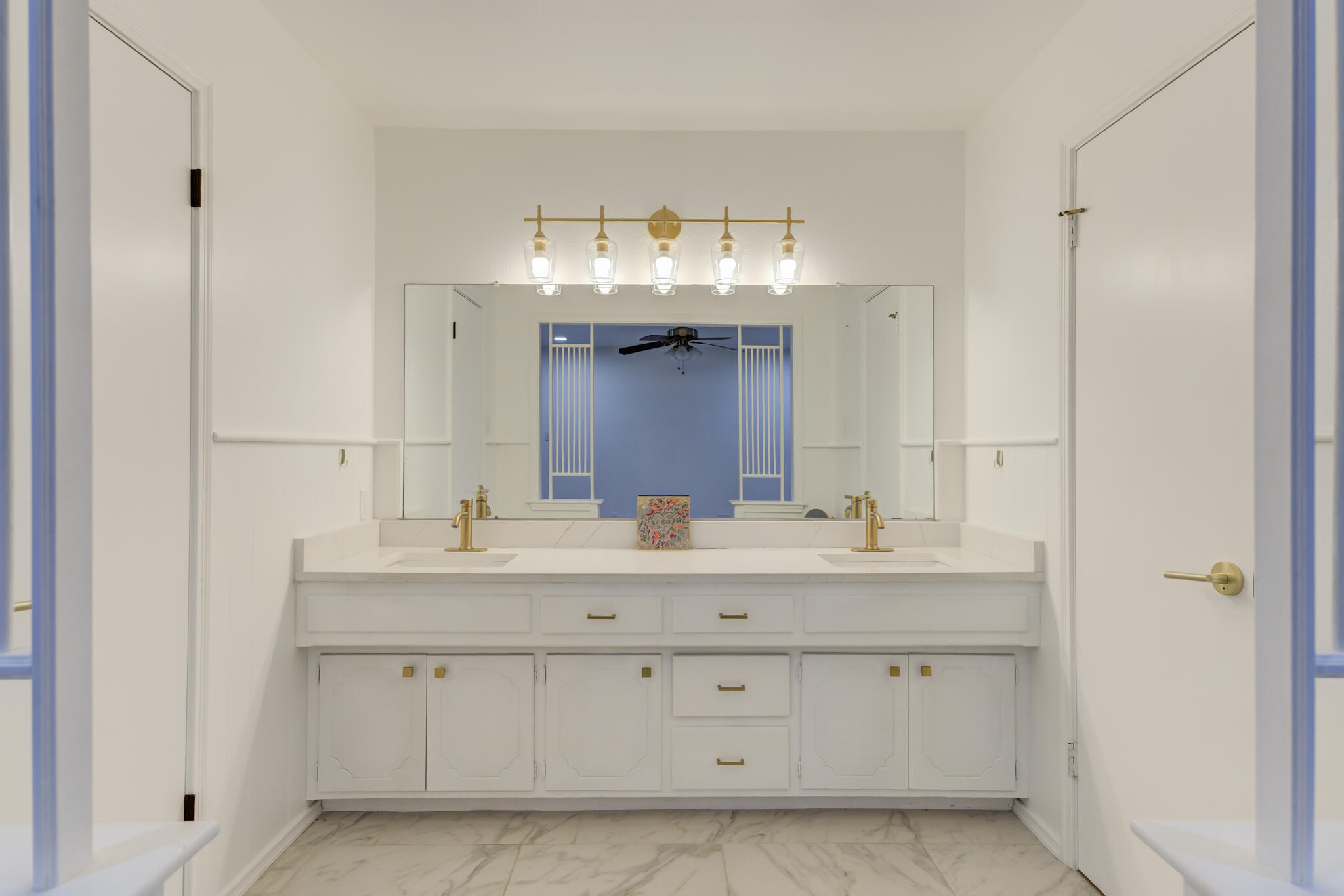 3023 66th Street Lubbock, TX 79413 - Photo 24 of 40 a bathroom with a double vanity sink mirror and
