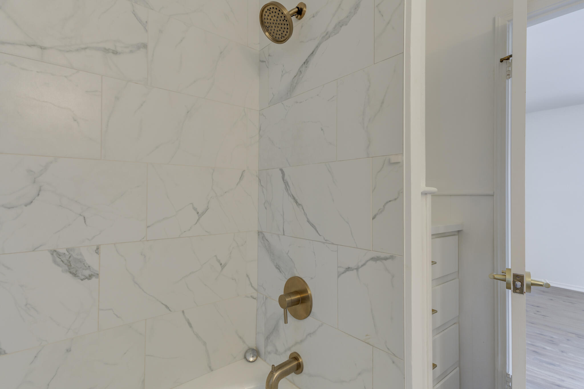 3023 66th Street Lubbock, TX 79413 - Photo 31 of 40 a bathroom with a shower