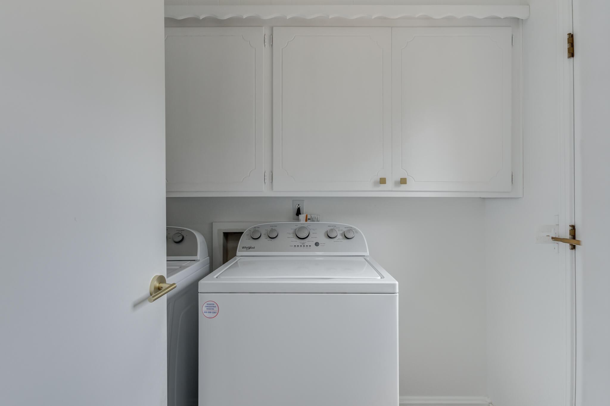 3023 66th Street Lubbock, TX 79413 - Photo 34 of 40 a utility room with dryer and washer