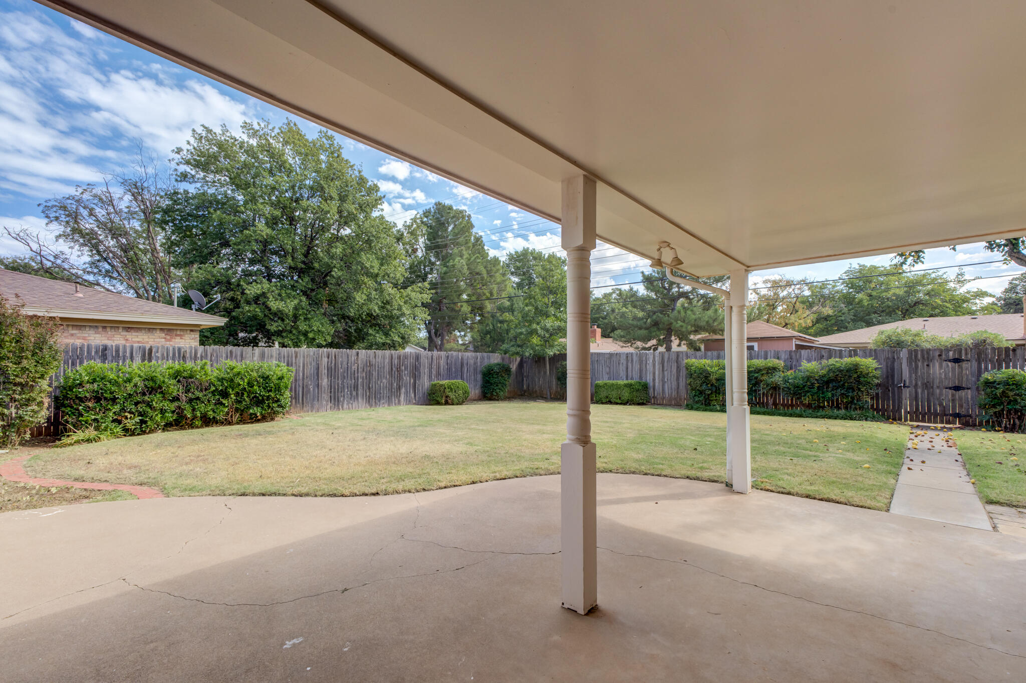 3023 66th Street Lubbock, TX 79413 - Photo 36 of 40 a view of a yard with porch
