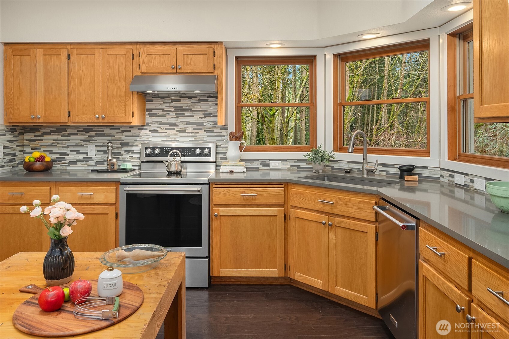 12908 Southwest 244th Place Vashon, WA 98070 - Photo 14 of 30 a kitchen with a sink cabinets and window