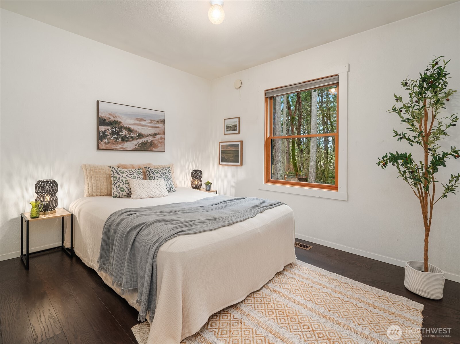 12908 Southwest 244th Place Vashon, WA 98070 - Photo 17 of 30 a bedroom with bed and a window