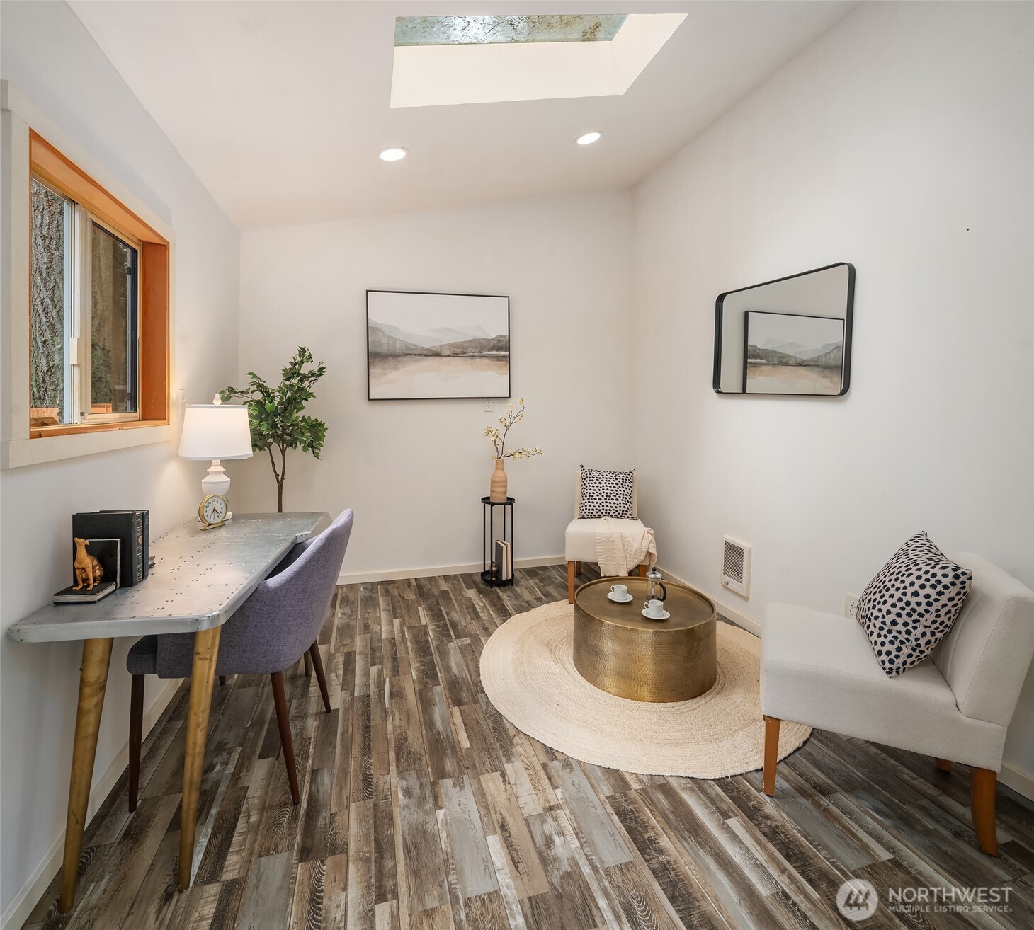 12908 Southwest 244th Place Vashon, WA 98070 - Photo 25 of 30 a view of a dining room with furniture and wooden floor