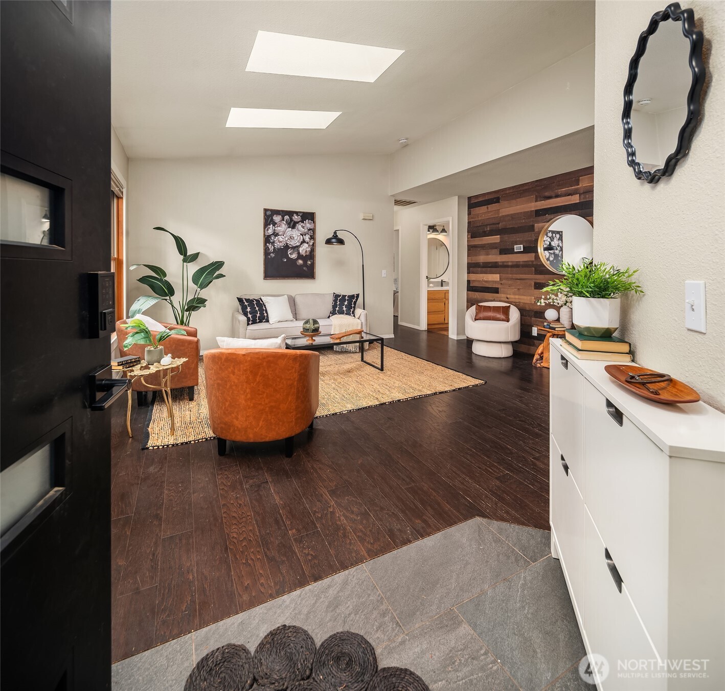 12908 Southwest 244th Place Vashon, WA 98070 - Photo 5 of 30 a living room with furniture and a wooden floor