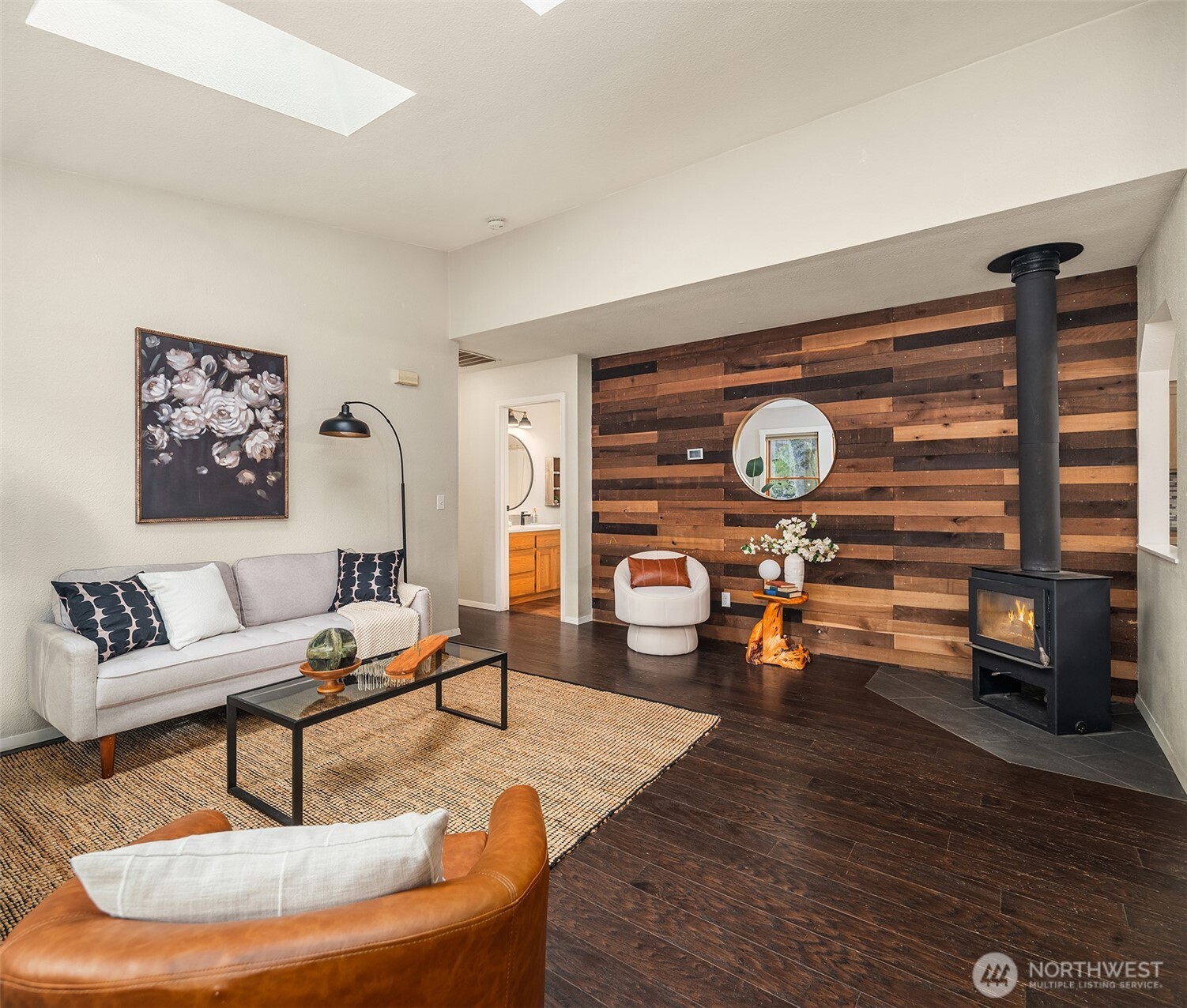 12908 Southwest 244th Place Vashon, WA 98070 - Photo 6 of 30 a living room with furniture and a clock
