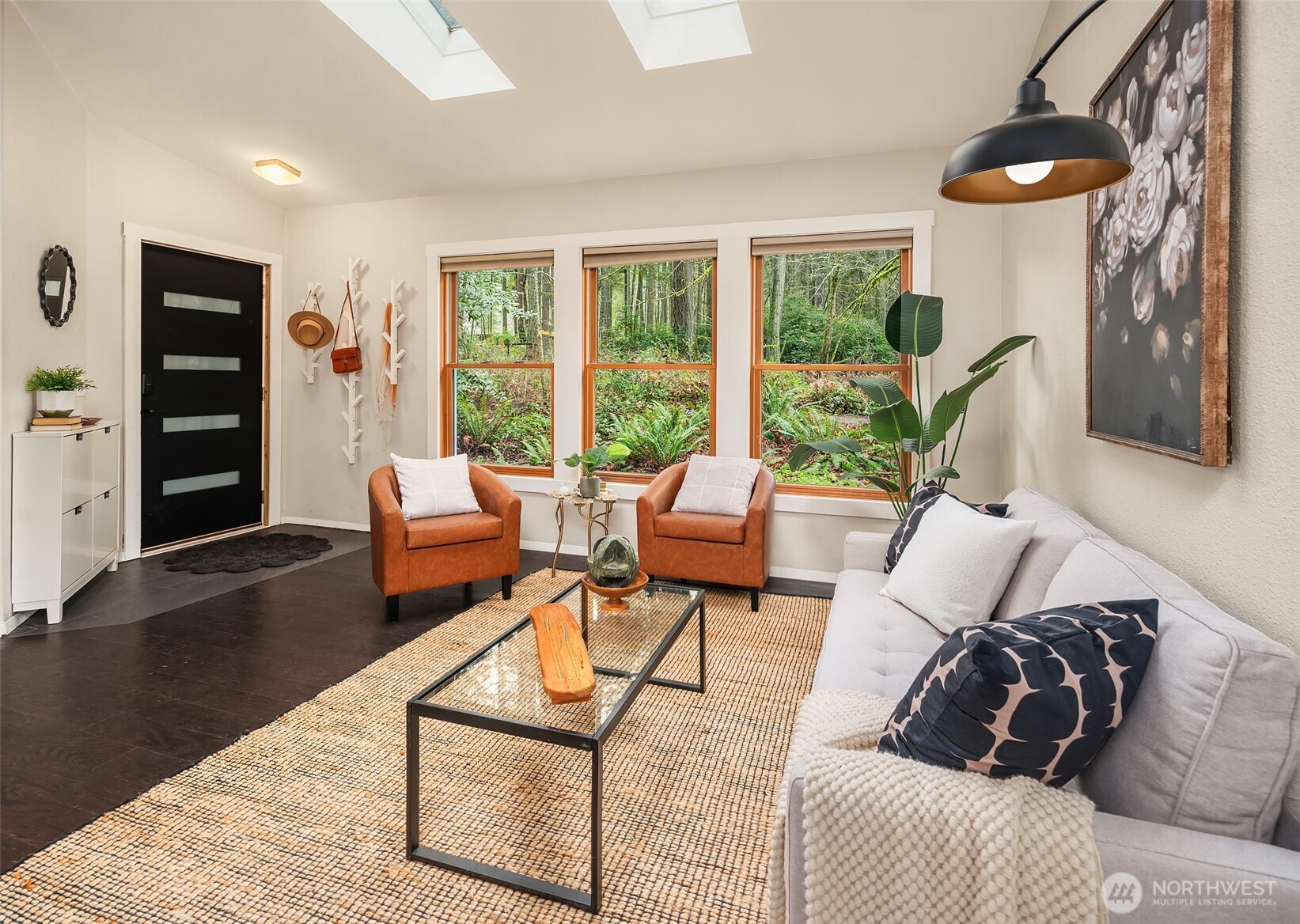 12908 Southwest 244th Place Vashon, WA 98070 - Photo 8 of 30 a living room with furniture large window and wooden floor