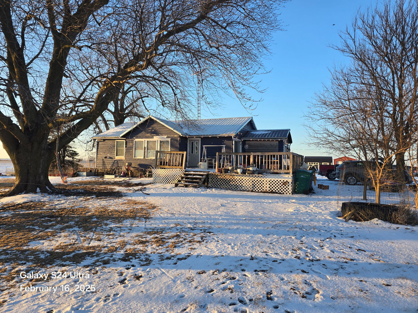 2049 North 18th Road Streator, IL 61364 - Photo 1 of 15 a house with trees in front of it